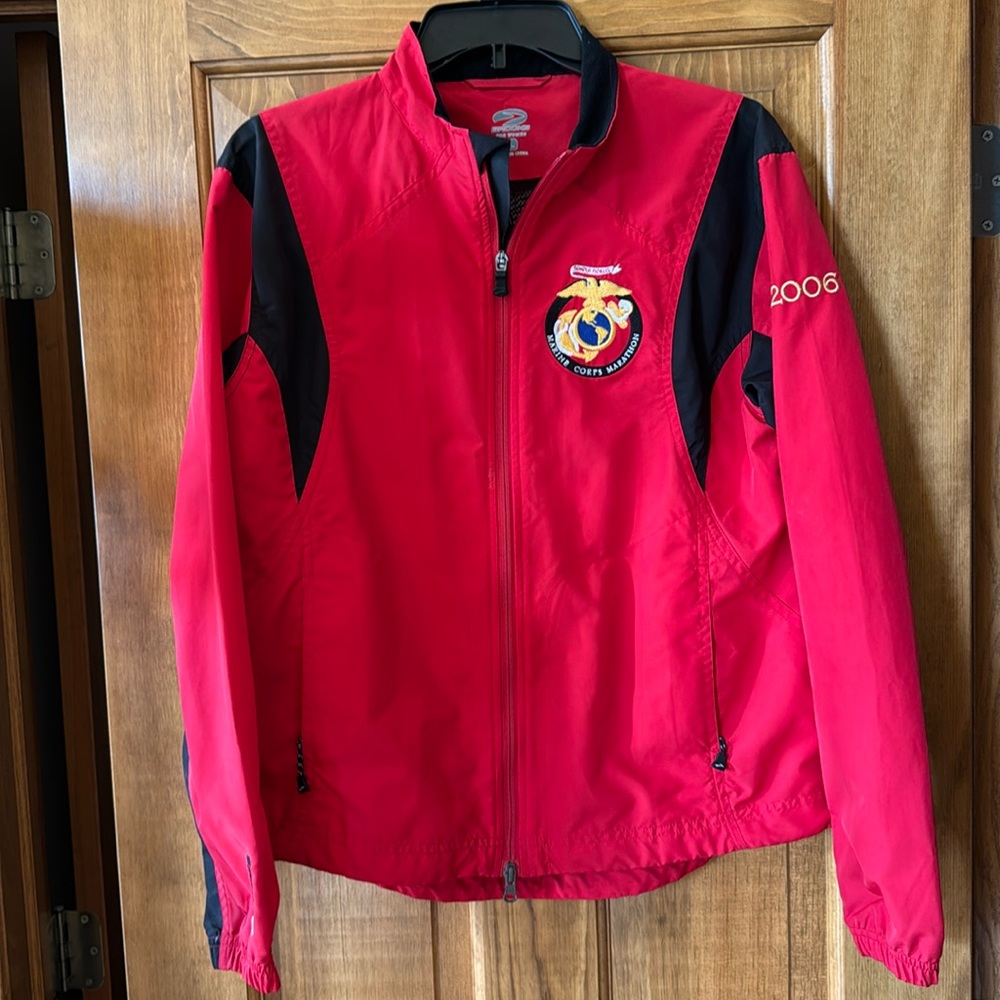 Brooks women’s red marine corps marathon jacket. Size Large, 2006